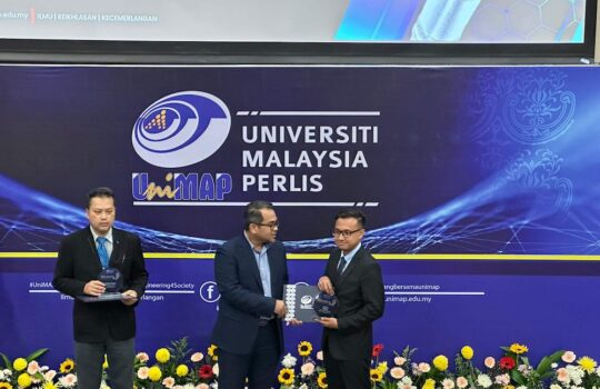 NSW Automation representative presenting a scholarship award to an outstanding UniMAP student at the 19th Convocation Ceremony in 2024.